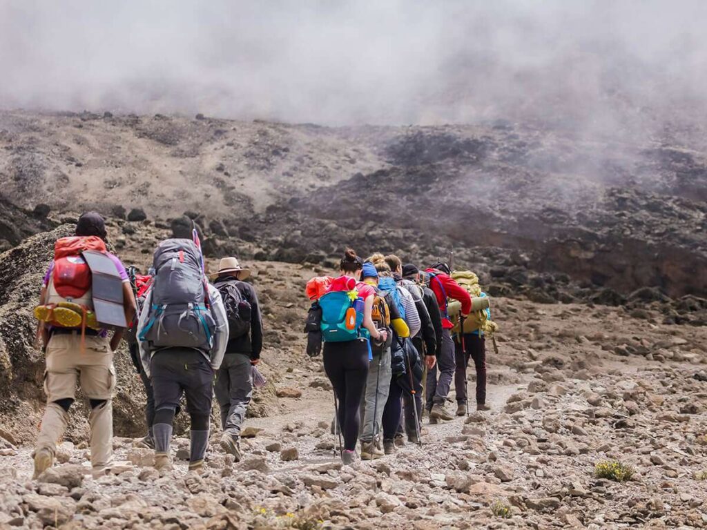 Trekkers on a Kilimanjaro Group Climbs 2026–2027 route